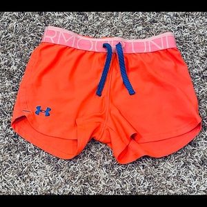Girls volleyball and running shorts